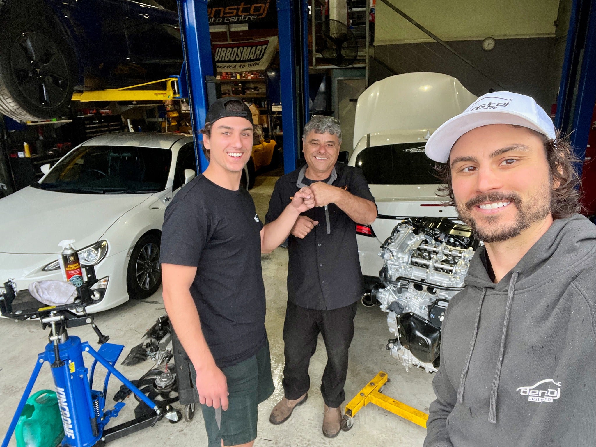Dennis and his two sons in the Denstoj workshop in Carrington