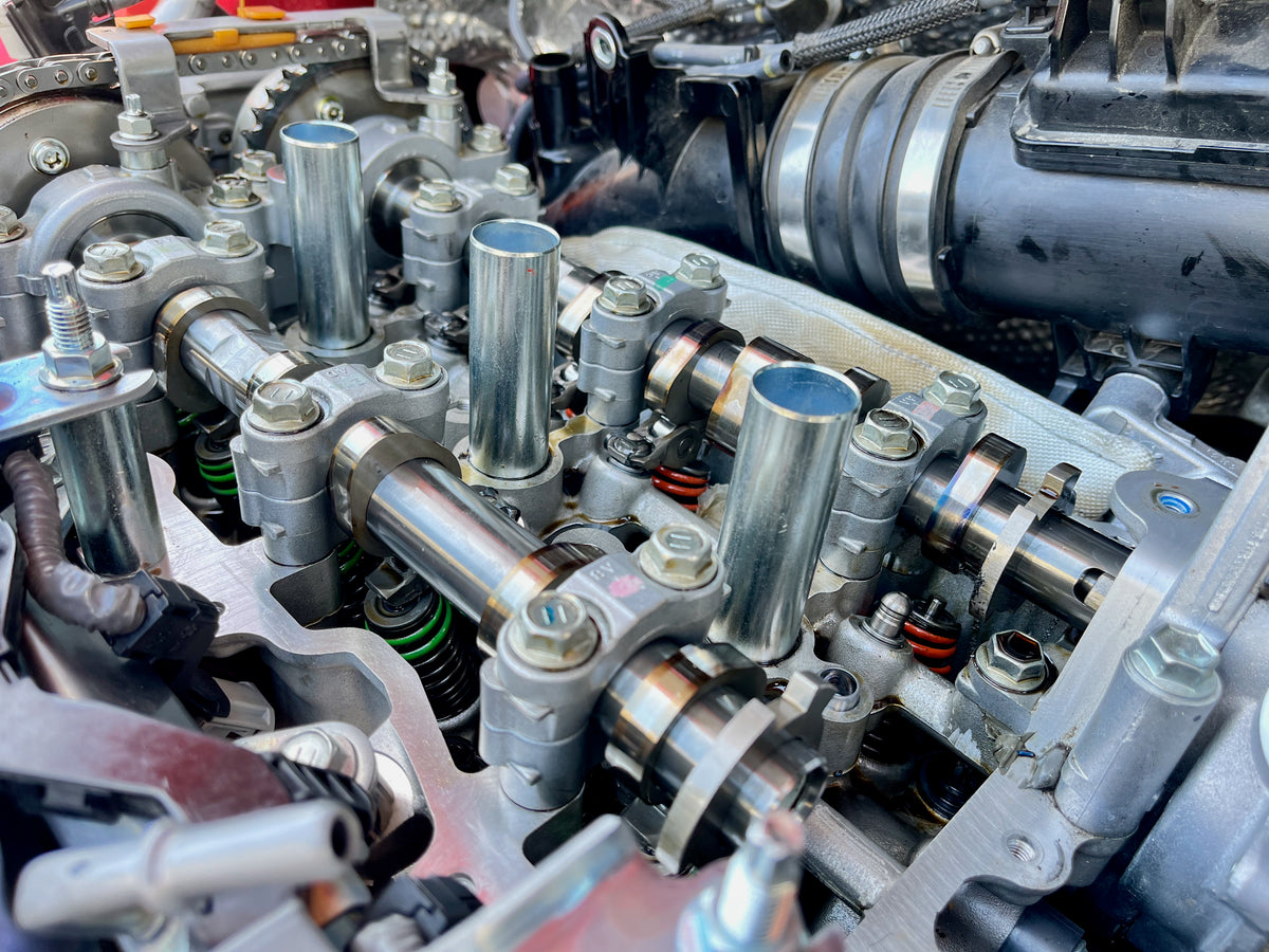 Toyota G16E-GTS cylinder head with camshafts and rocker arms exposed